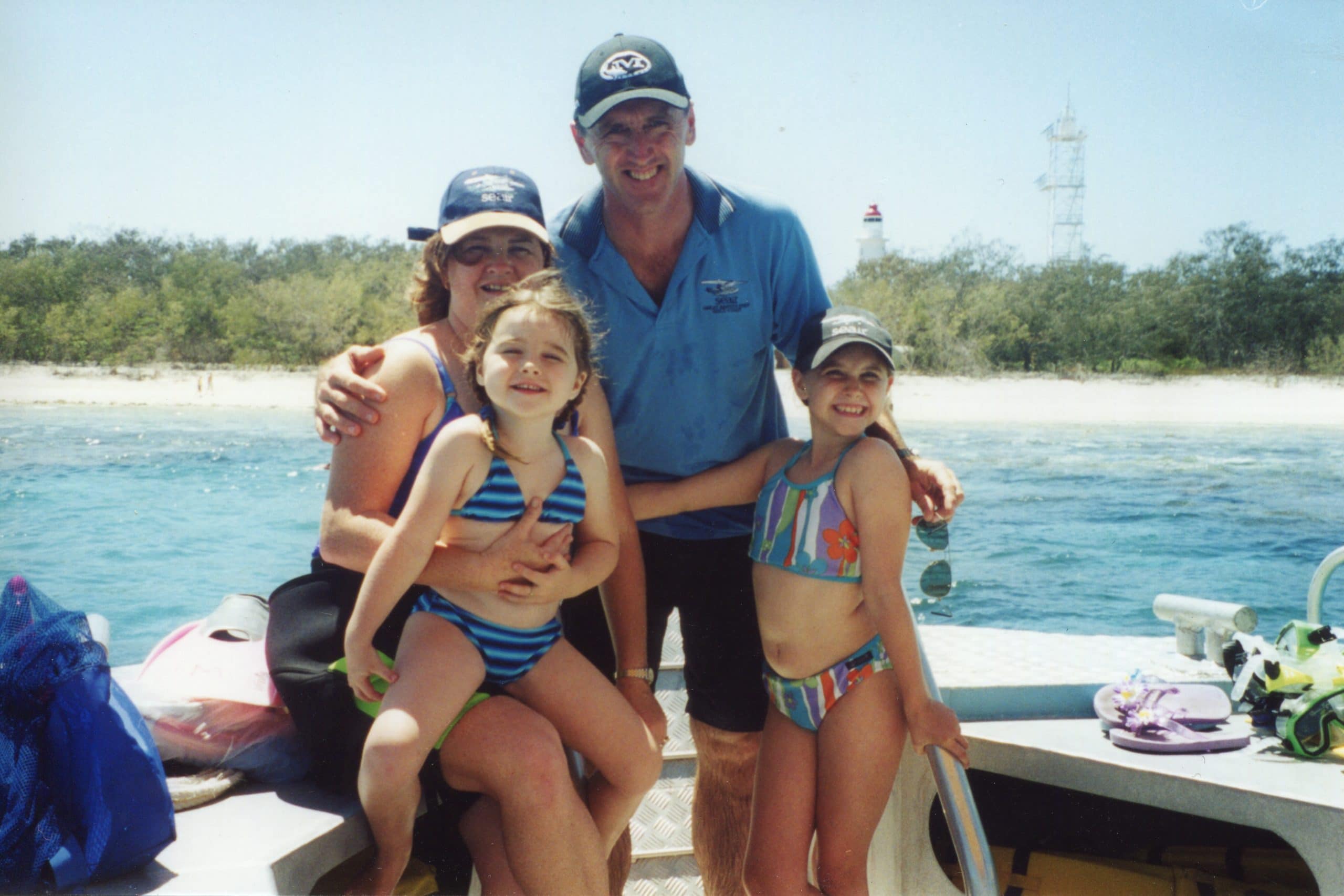 Peter, Julie, Amy and Chloe Gash on a boat off Lady Elliot Island circa 2000.