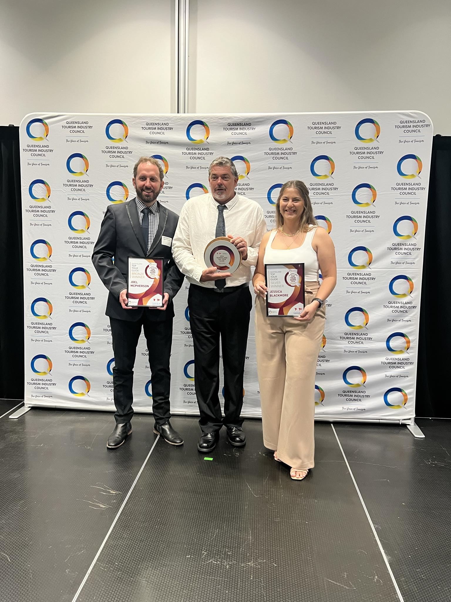 Jessica accepting Silver at the 2024 Queensland Top Tourism Awards